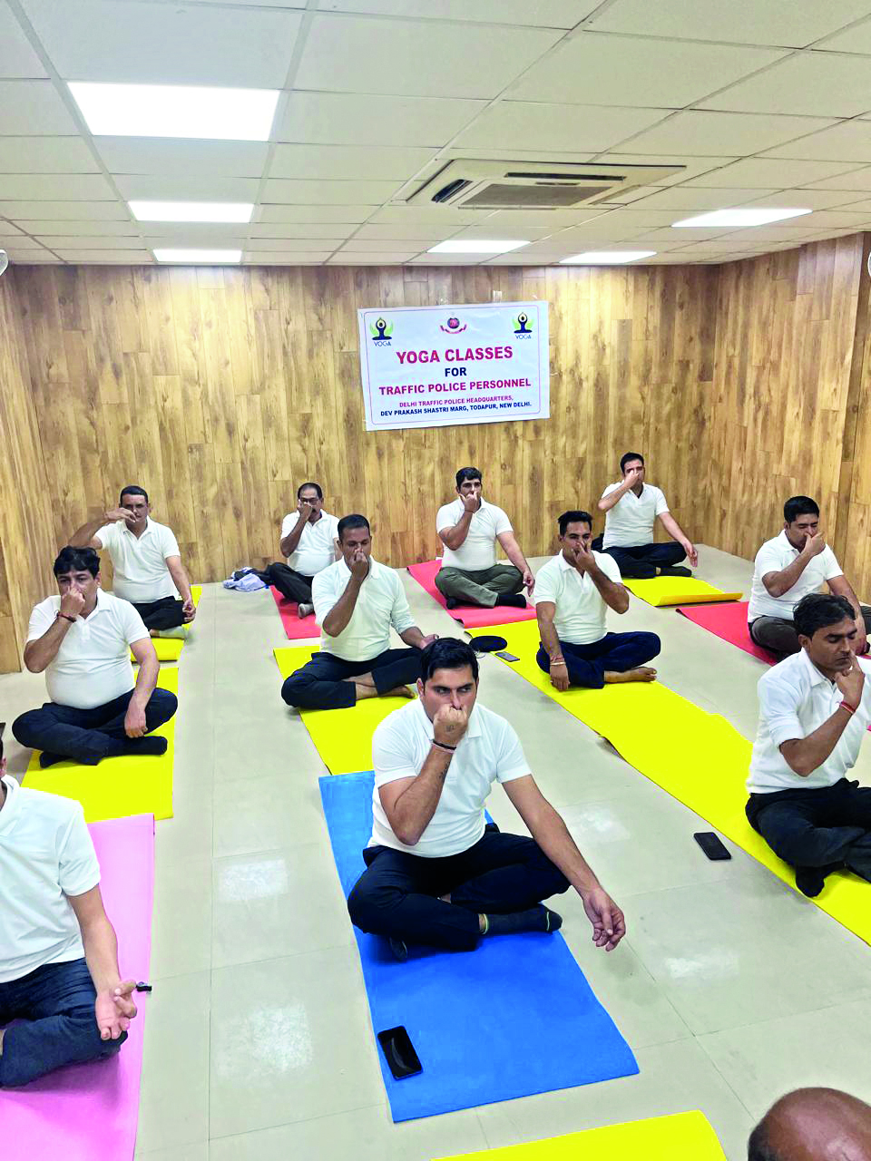 Yoga session for traffic police personnel held to counter pollution’s health effects Yoga session for traffic police personnel held to counter pollution’s health effects