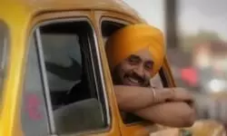 Diljit Dosanjh rides iconic yellow taxi before Kolkata concert Diljit Dosanjh rides iconic yellow taxi before Kolkata concert
