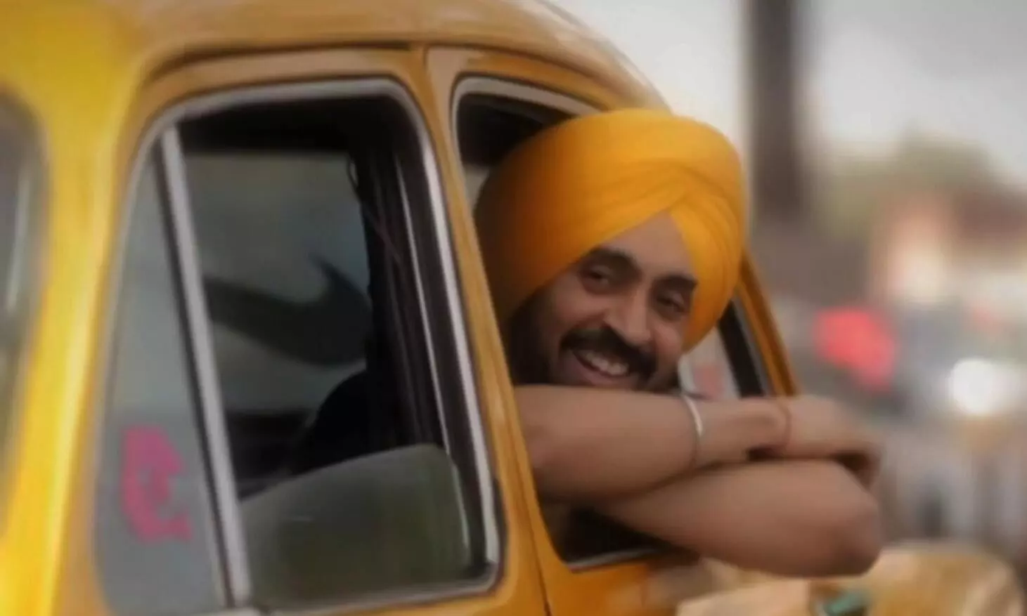 Diljit Dosanjh rides iconic yellow taxi before Kolkata concert Diljit Dosanjh rides iconic yellow taxi before Kolkata concert