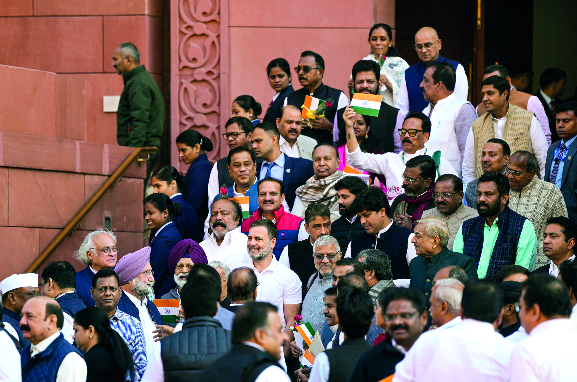 Small tricolour and red rose in hand, several Opposition MPs urge Govt to run House in Parl Small tricolour and red rose in hand, several Opposition MPs urge Govt to run House in Parl