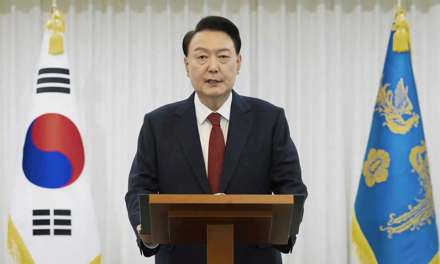 South Korean leaders seek calm after Yoon is impeached