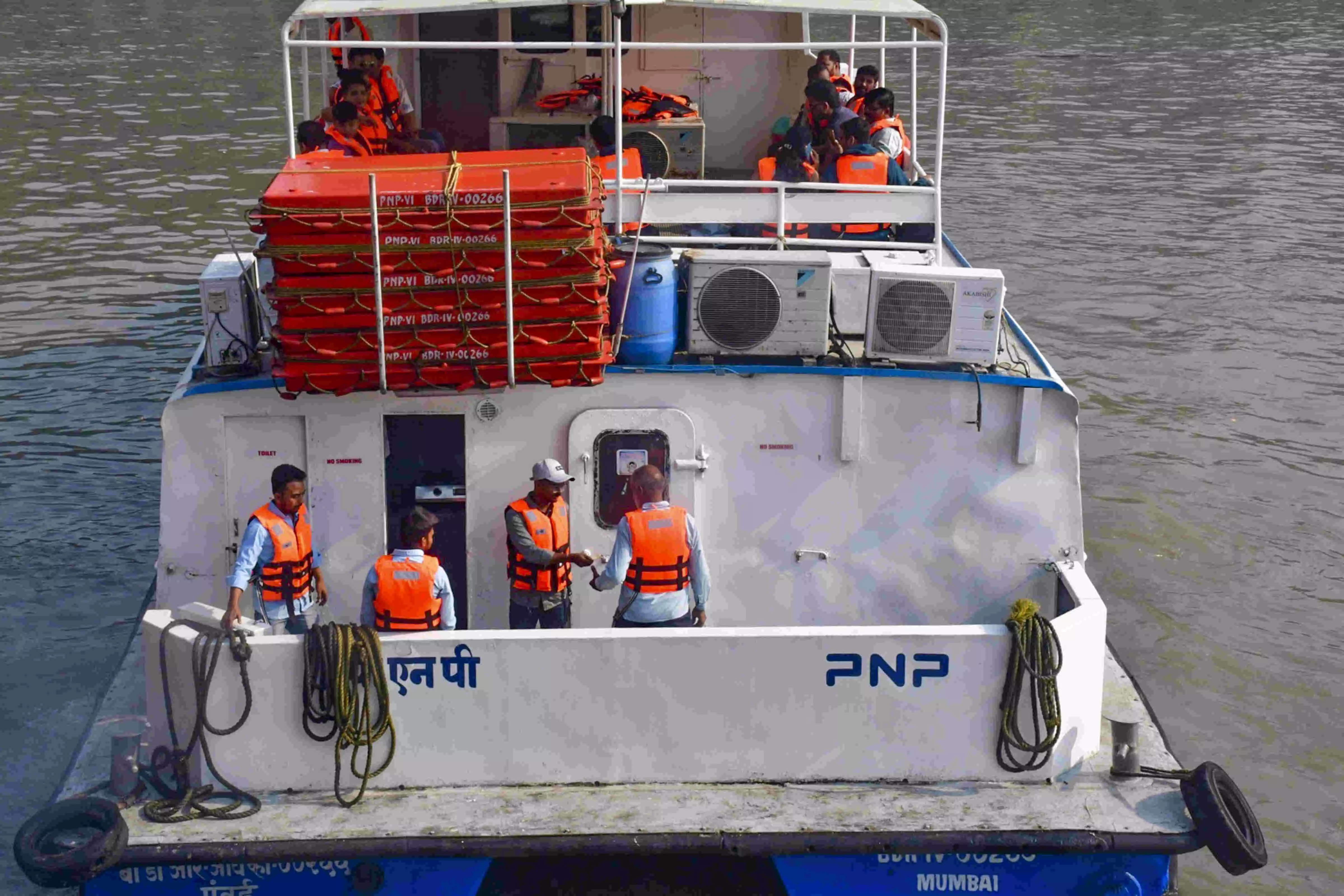 Navy helicopter, boats looking for 2 missing after ferry-craft collision Navy helicopter, boats looking for 2 missing after ferry-craft collision