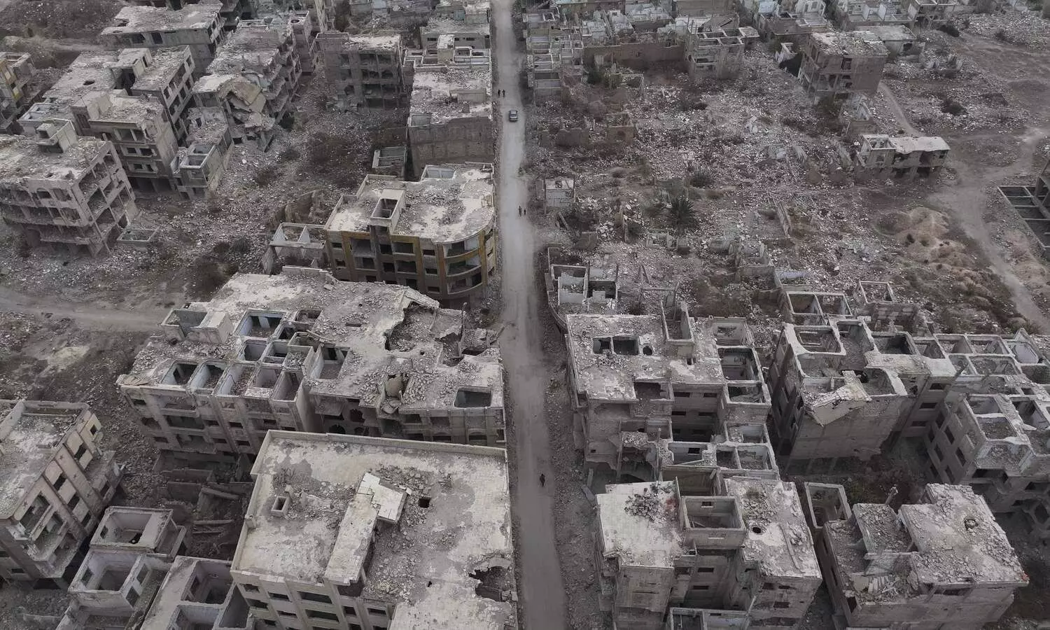 In Assads hometown, few shared in his familys fortune and hope they wont share in his downfall