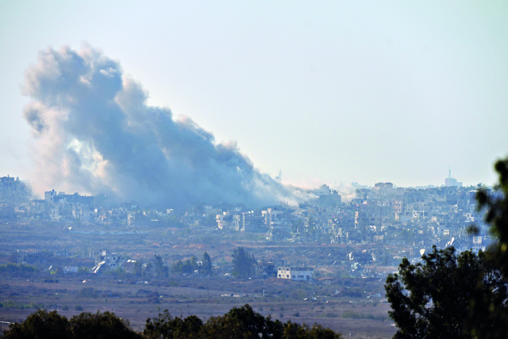 Israeli airstrikes on Gaza kill at least 20 people, say Palestinian medics