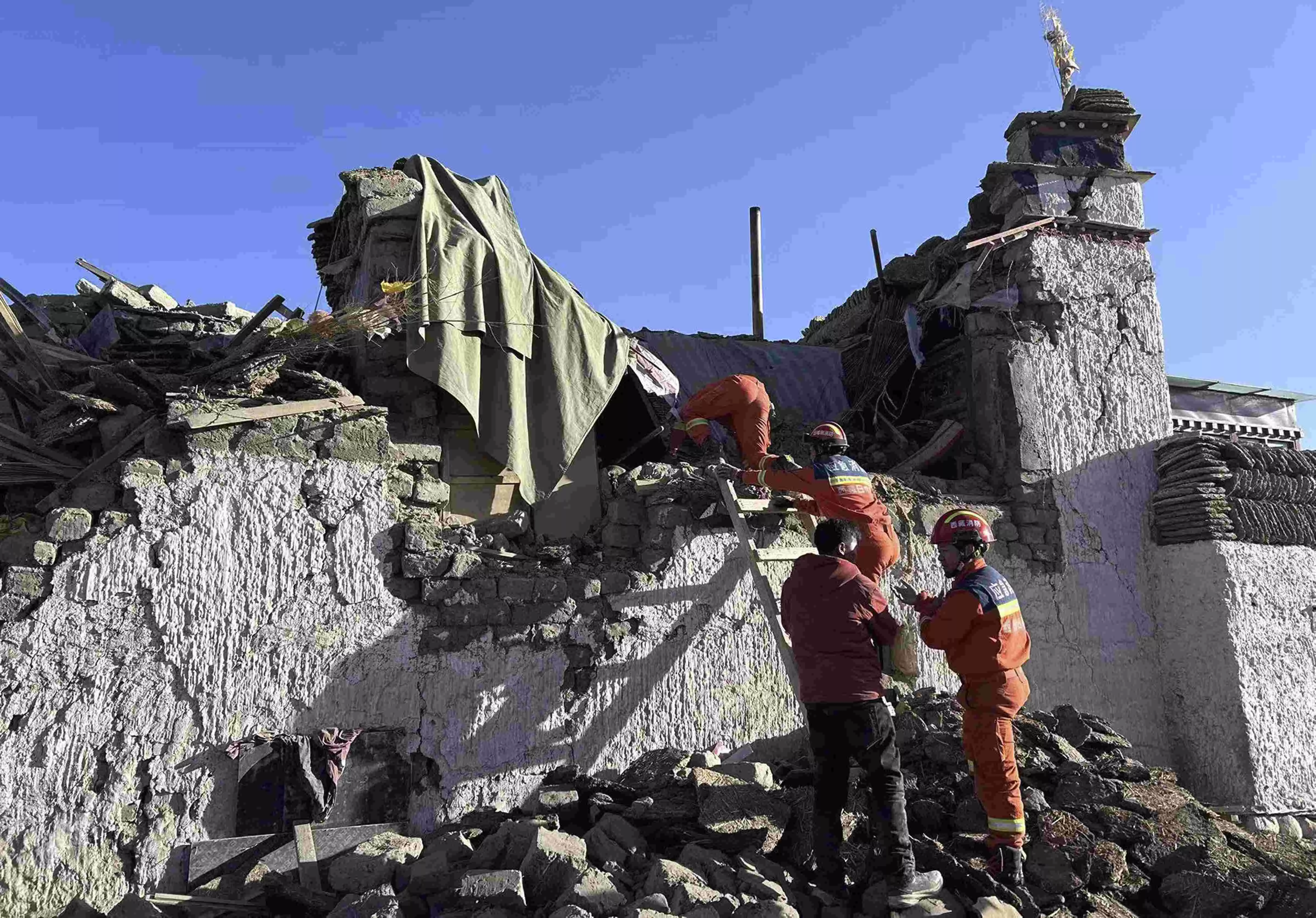 6.8-magnitude quake in Tibet kills 95 people with tremors felt in Nepal