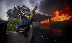 30,000 people under evacuation orders as wildfire whips through Los Angeles hillsides