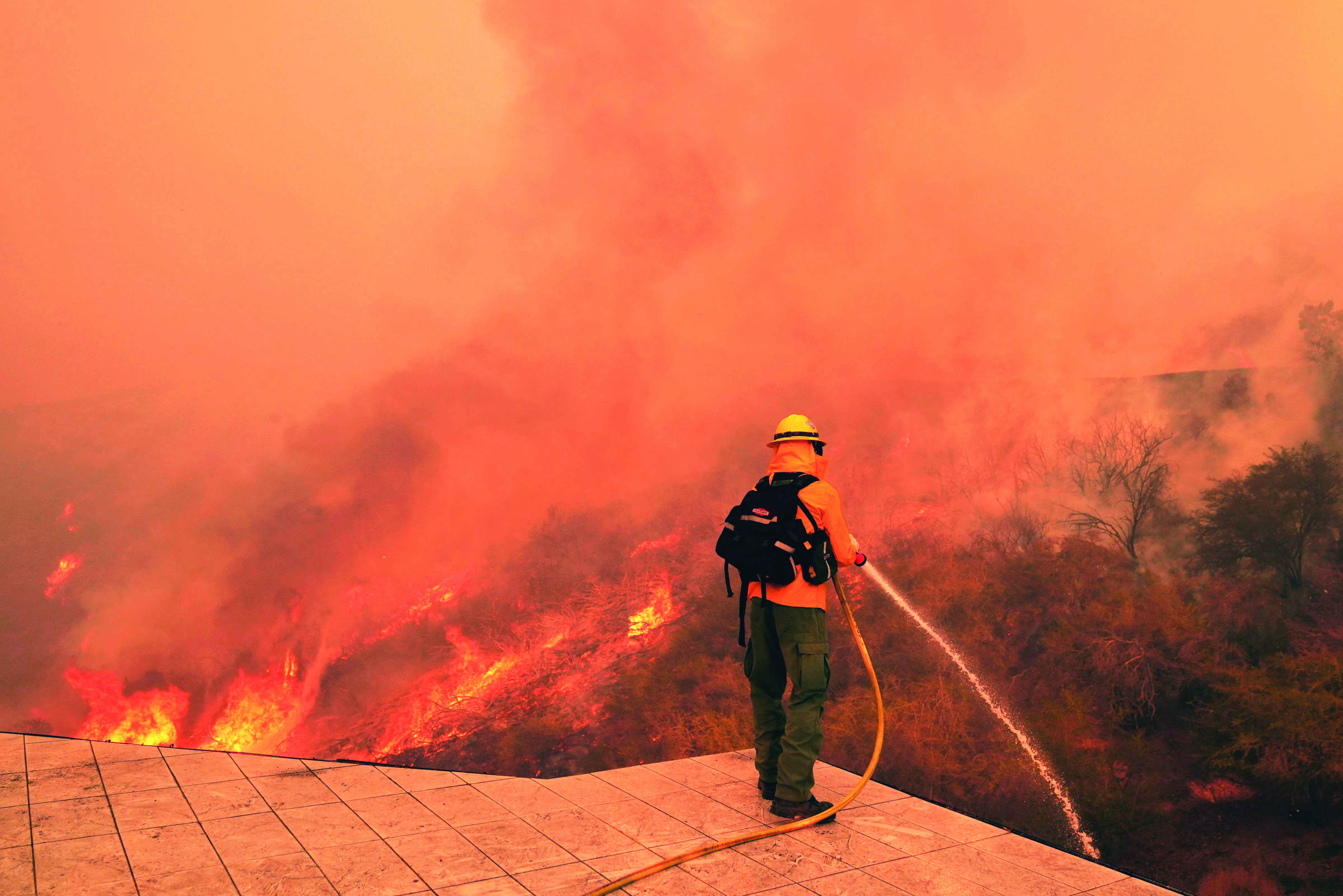 LA wildfires death toll rises as crews fight heavy winds to save landmarks