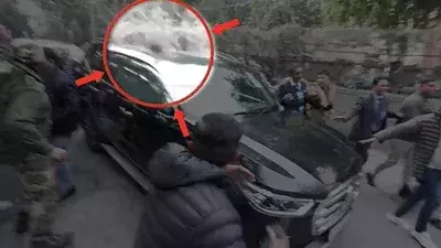 AAP claims Kejriwals car attacked during campaigning; BJP alleges vehicle hit 2 youths