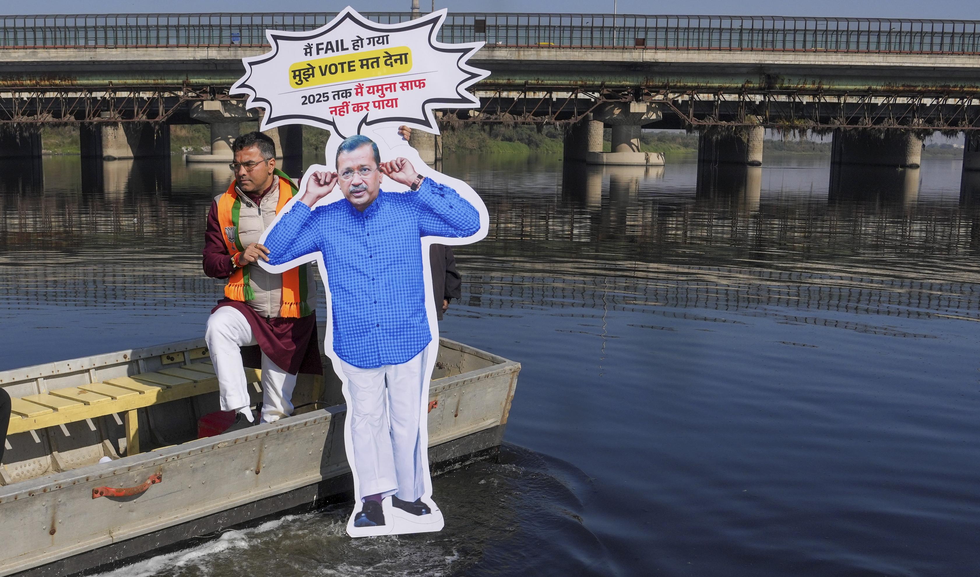 BJPs Verma immerses Kejriwals effigy in Yamuna; his antics have no takers, says AAP