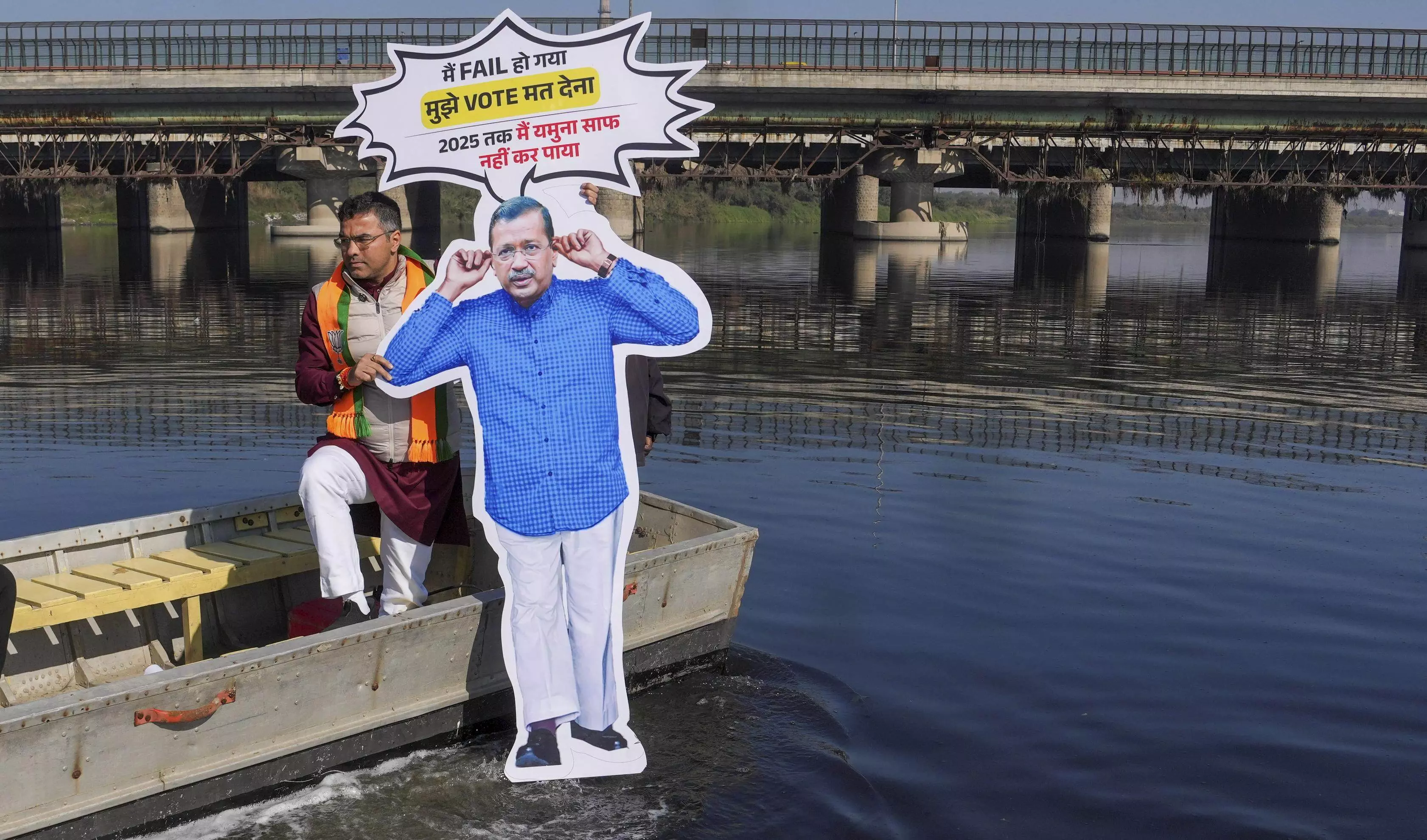 BJPs Verma immerses Kejriwals effigy in Yamuna; his antics have no takers, says AAP