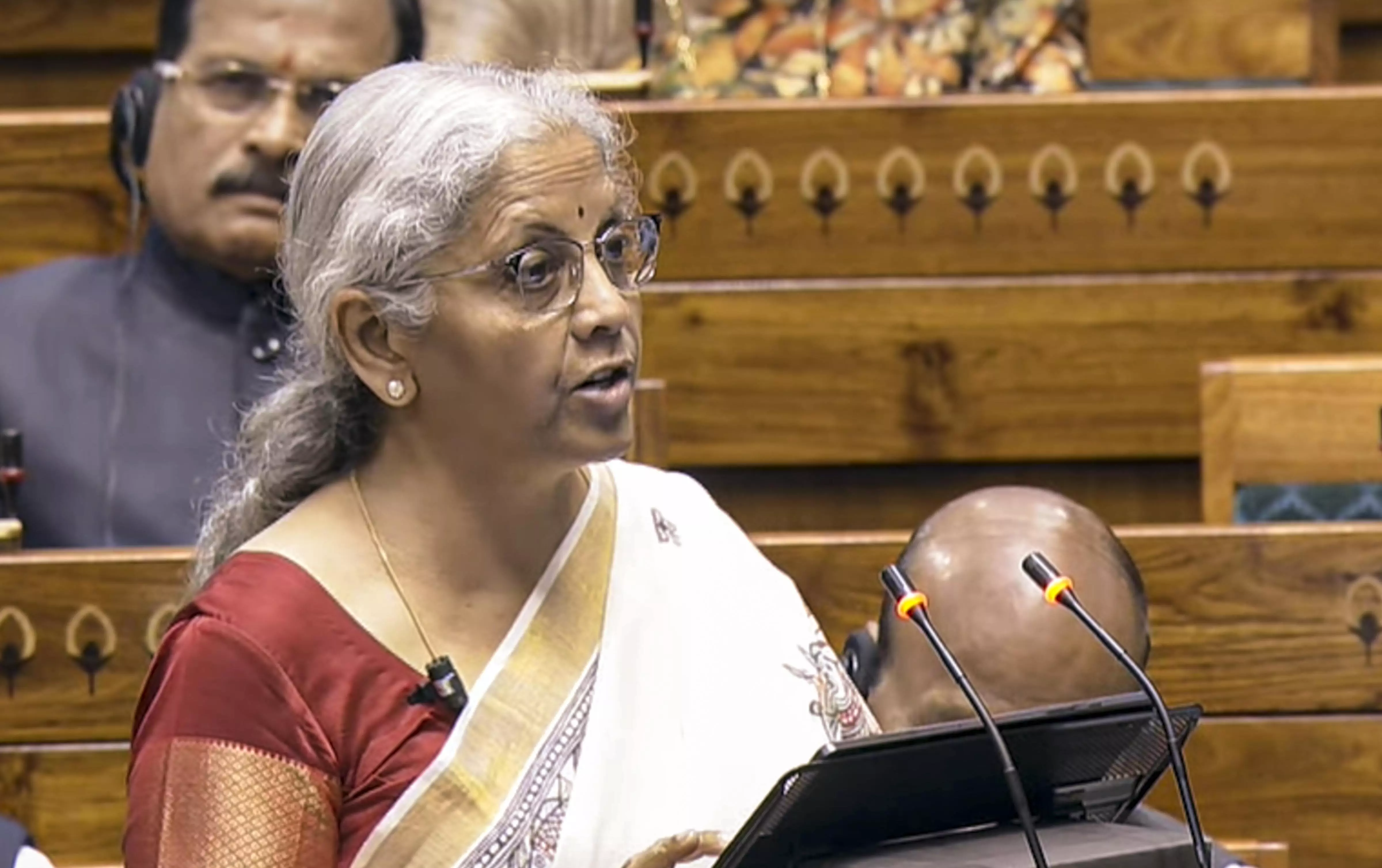 Sitharaman cuts taxes for middle class in peoples Budget Sitharaman cuts taxes for middle class in peoples Budget