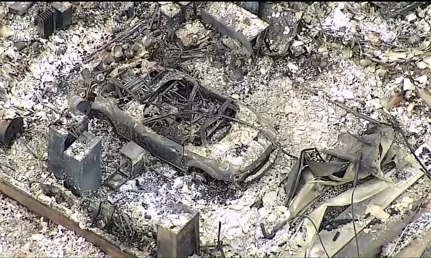 Tornadoes, wildfires and blinding dust sweep across US as massive storm leaves at least 37 dead