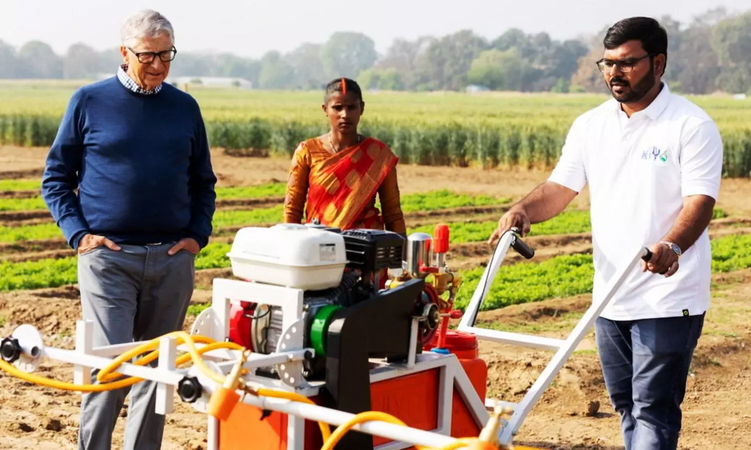 Bill Gates tries his hand at pesticide sprayer made by startup to ease farmers woes