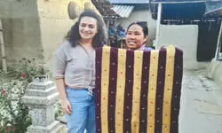 Woman from London visits remote South Dinajpur village to buy handmade carpet