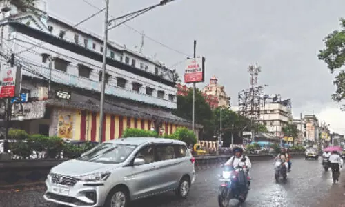 Relief from scorching heat: City plunges into darkness as heavy rains lash Kolkata