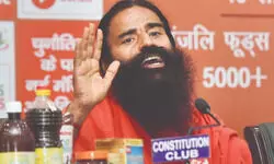 Delhi HC orders Ramdev to remove video targeting Rooh Afza, warns of contempt Delhi HC orders Ramdev to remove video targeting Rooh Afza, warns of contempt