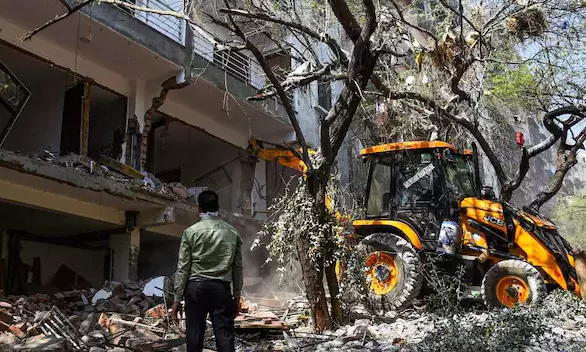 DDA carries out demolition drive in Sainik Farms to reclaim encroached land DDA carries out demolition drive in Sainik Farms to reclaim encroached land