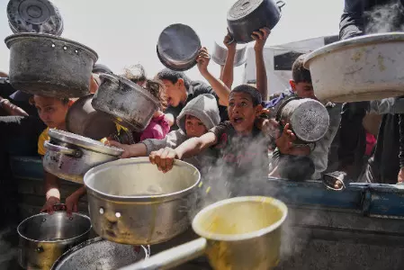 Desperate children, adults in Gaza struggle to get food as Israel blocks aid Desperate children, adults in Gaza struggle to get food as Israel blocks aid