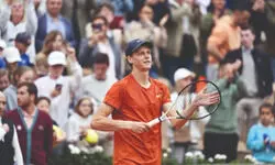 Sinner wins in return from doping ban before home crowd