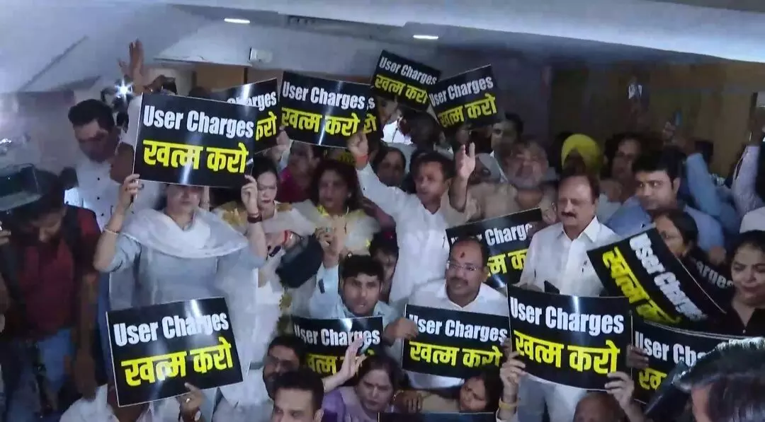 AAP councillors protest outside Delhi mayors office over user fee rollback proposal AAP councillors protest outside Delhi mayors office over user fee rollback proposal