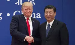 Trump and Xi hold telephone talks to defuse trade tensions
