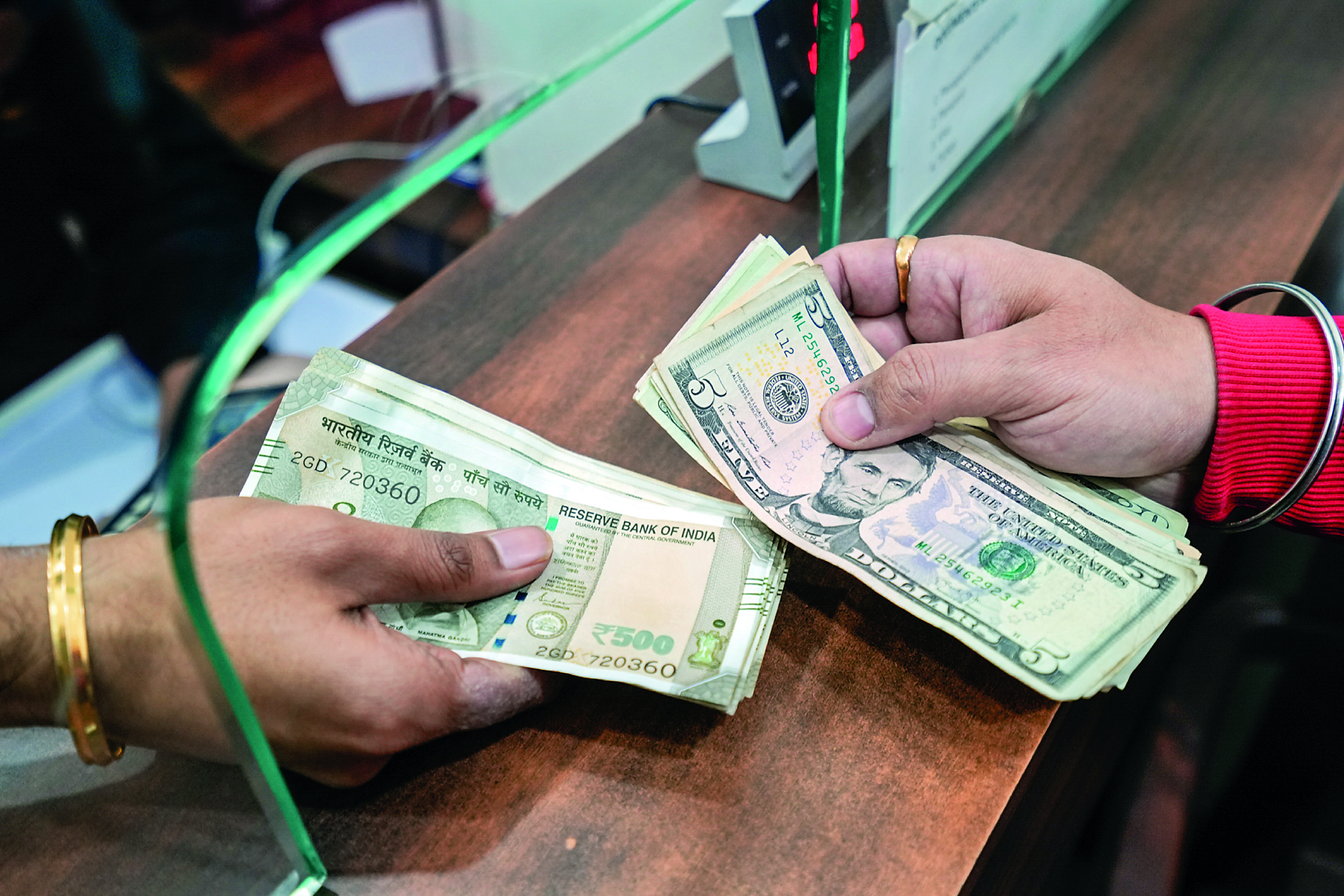 Rupee rises 8 paise to 85.79 against dollar