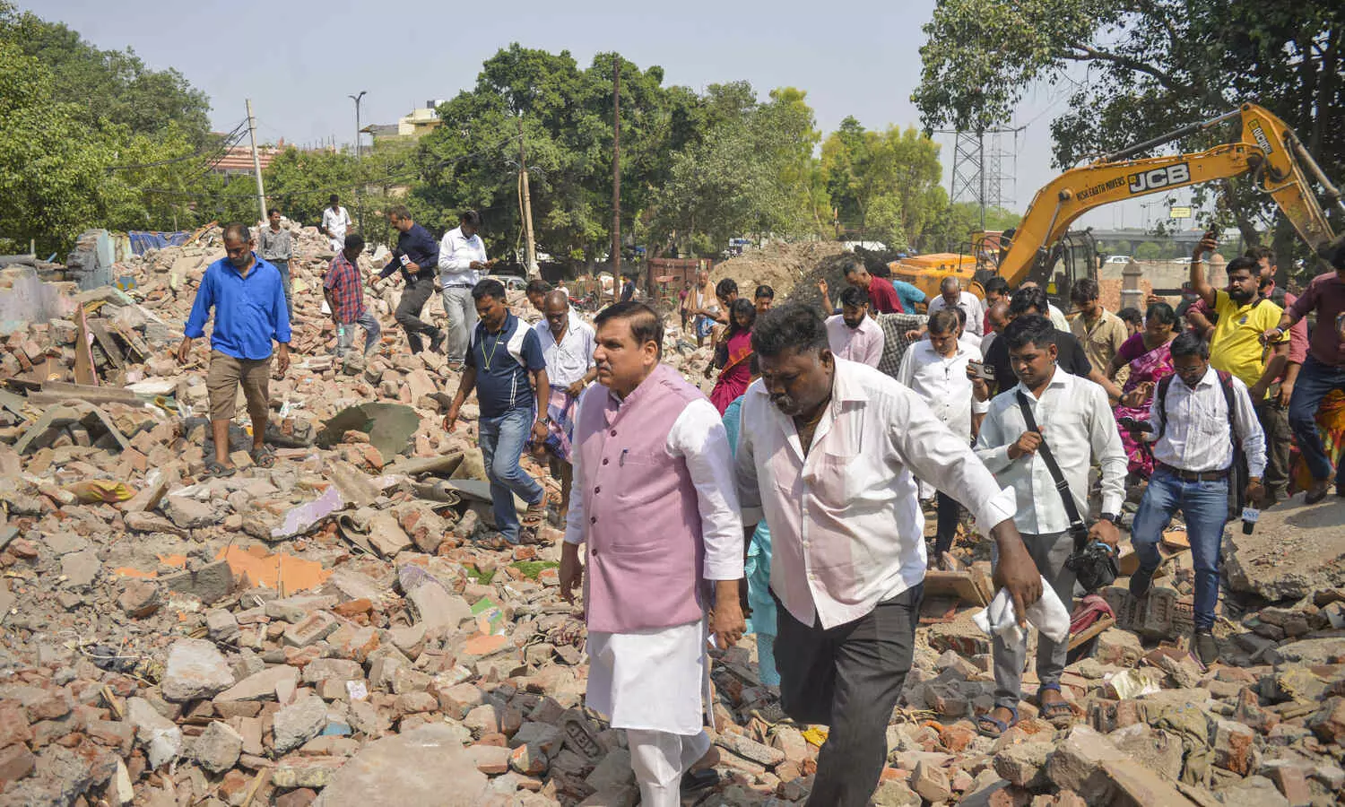 AAP leaders visit Madrasi Camp demolition site, vow to fight for slum dwellers rights