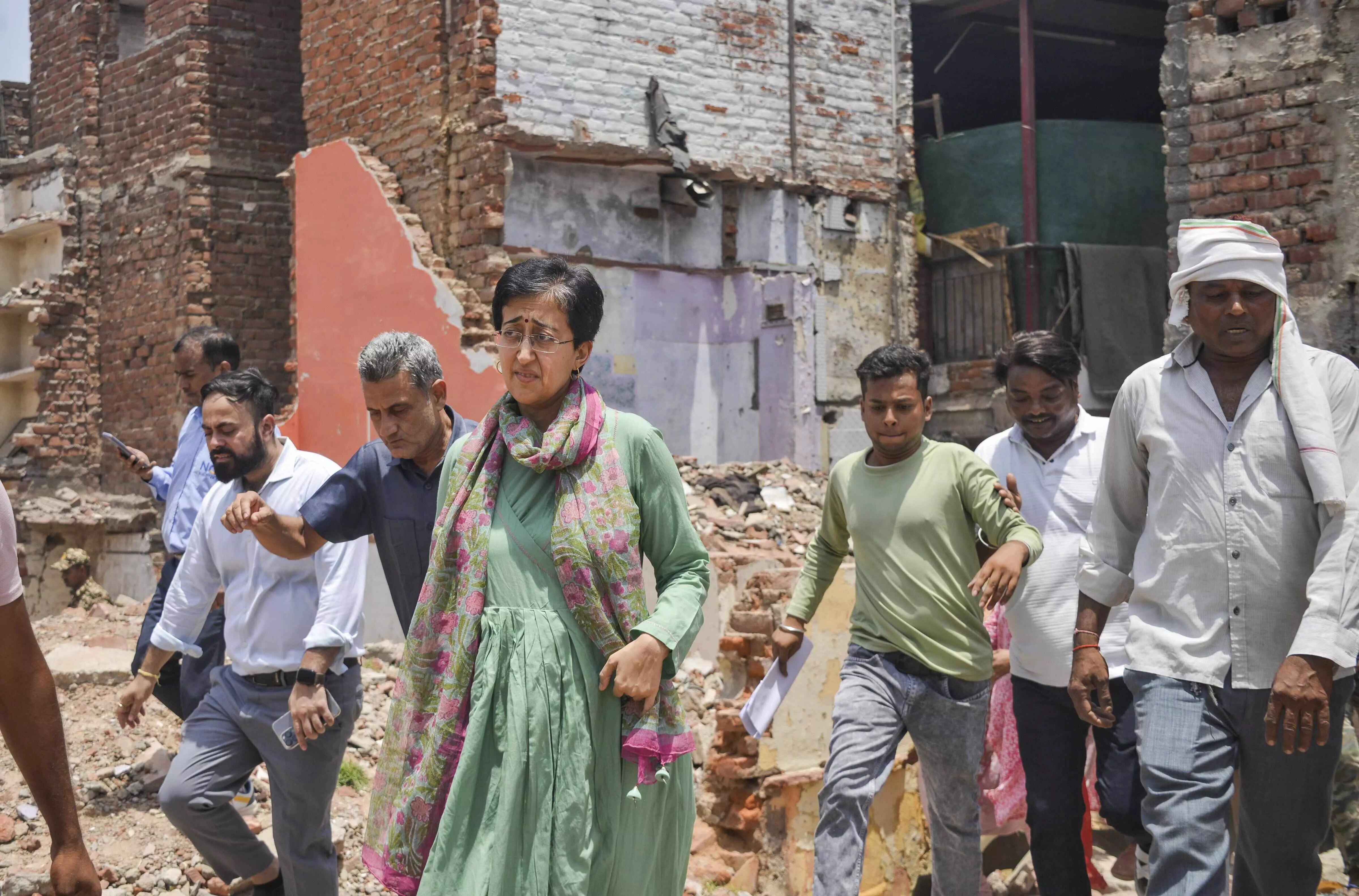 CM said no slum would be razed, then why bulldozer action in Bhoomiheen camp, asks Atishi CM said no slum would be razed, then why bulldozer action in Bhoomiheen camp, asks Atishi