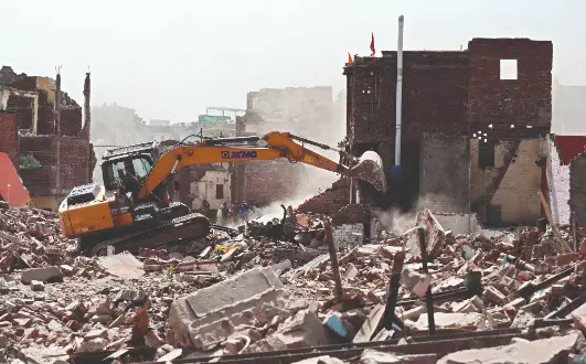 Authorities raze Govindpuri slum Authorities raze Govindpuri slum