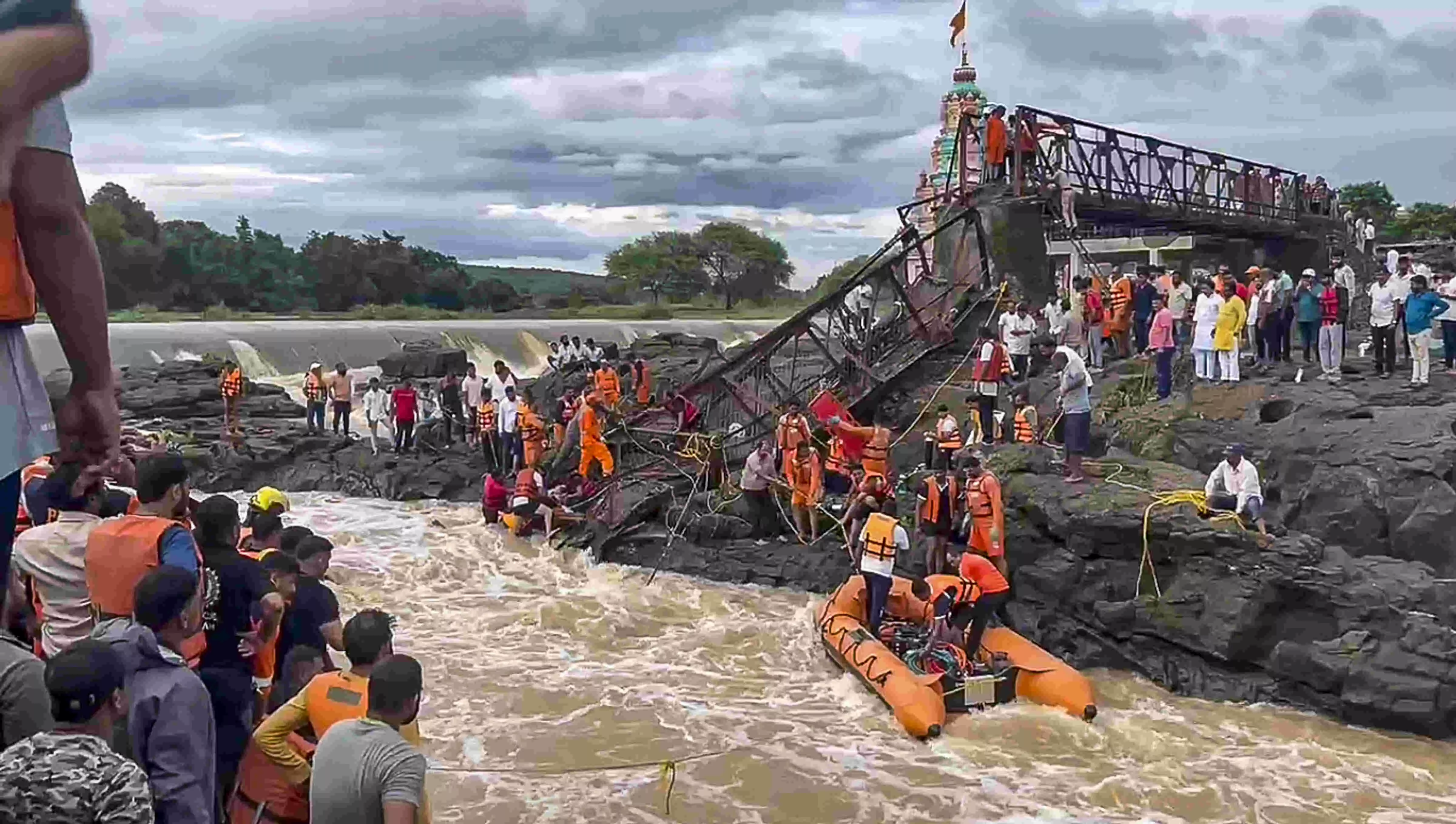 Police continue search operation at Pune bridge collapse site Police continue search operation at Pune bridge collapse site