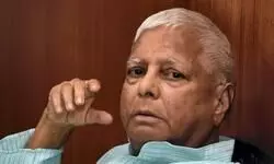 Lalu re-elected RJD president Lalu re-elected RJD president