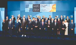 NATO leaders agree on spending hike, vow to defend each other NATO leaders agree on spending hike, vow to defend each other