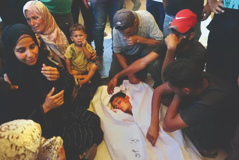 At least 22 people killed as Israeli forces fire on crowds at aid sites At least 22 people killed as Israeli forces fire on crowds at aid sites