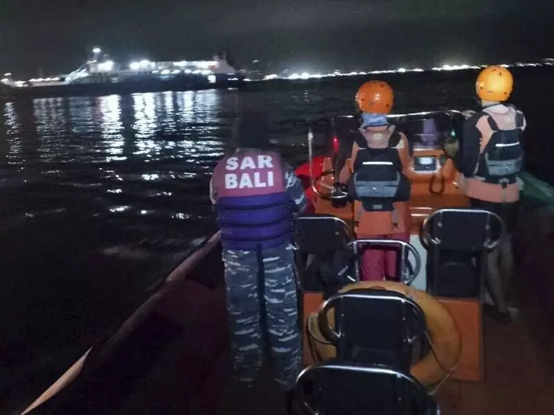 Ferry carrying 65 people sinks near Bali; rescuers search in rough seas for 38 missing