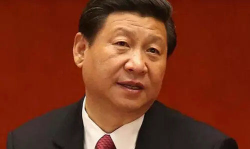 Chinese President Xis move to share power fuels speculation about his political future