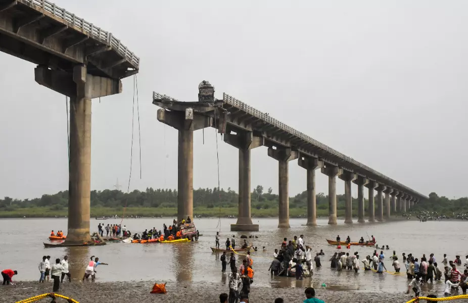 Gujarat bridge collapse: My kids and husband drowning, save them, pleads woman from middle of river Gujarat bridge collapse: My kids and husband drowning, save them, pleads woman from middle of river