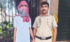 Forged identity, fake badge: Man held for posing as cop Forged identity, fake badge: Man held for posing as cop
