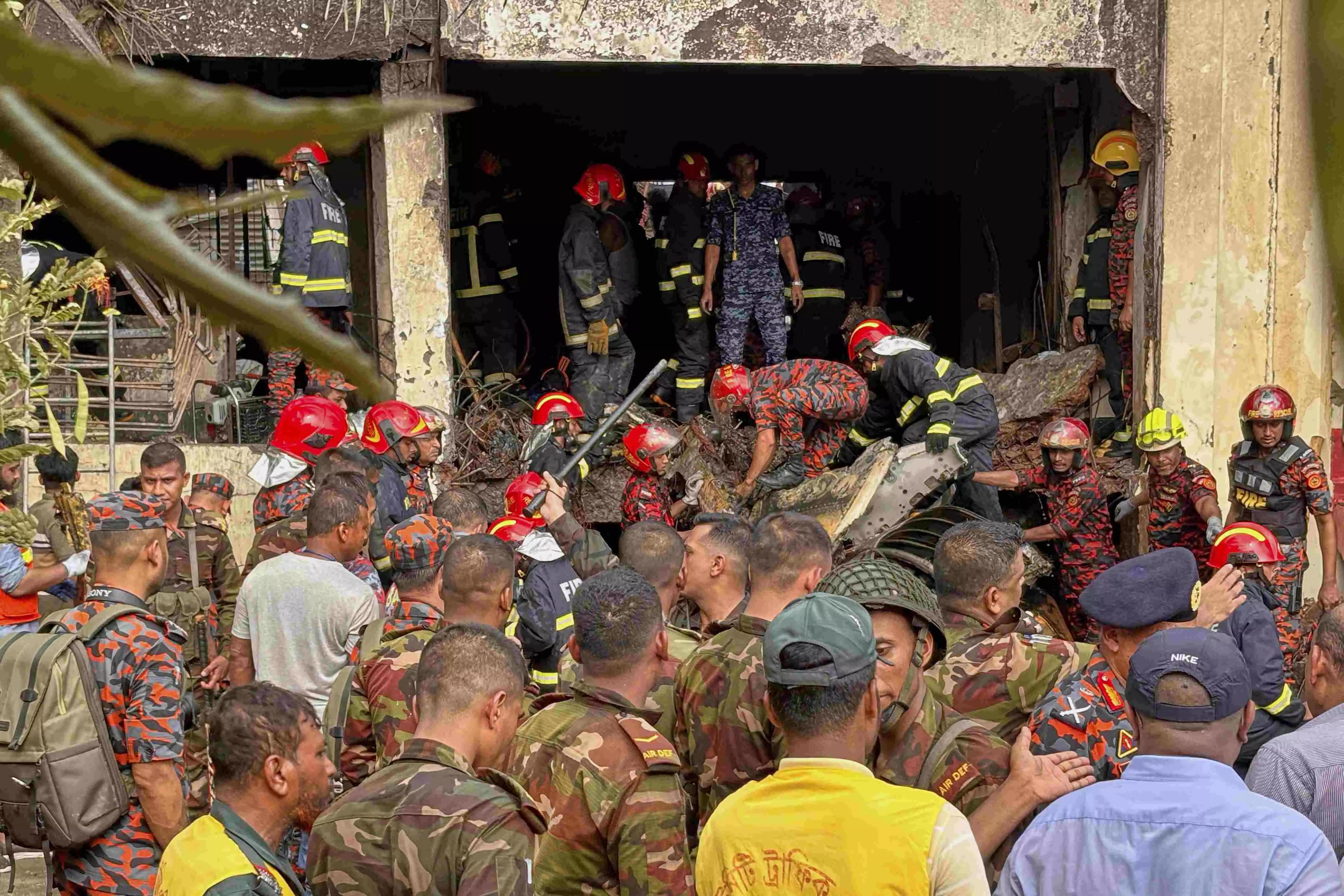 Bangladesh Air Force training aircraft crashes atop school building; at least 16 killed, dozens injured Bangladesh Air Force training aircraft crashes atop school building; at least 16 killed, dozens injured