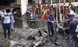 Grief, angst continues as toll in jet crash on school rises to 32 in Bangladesh
