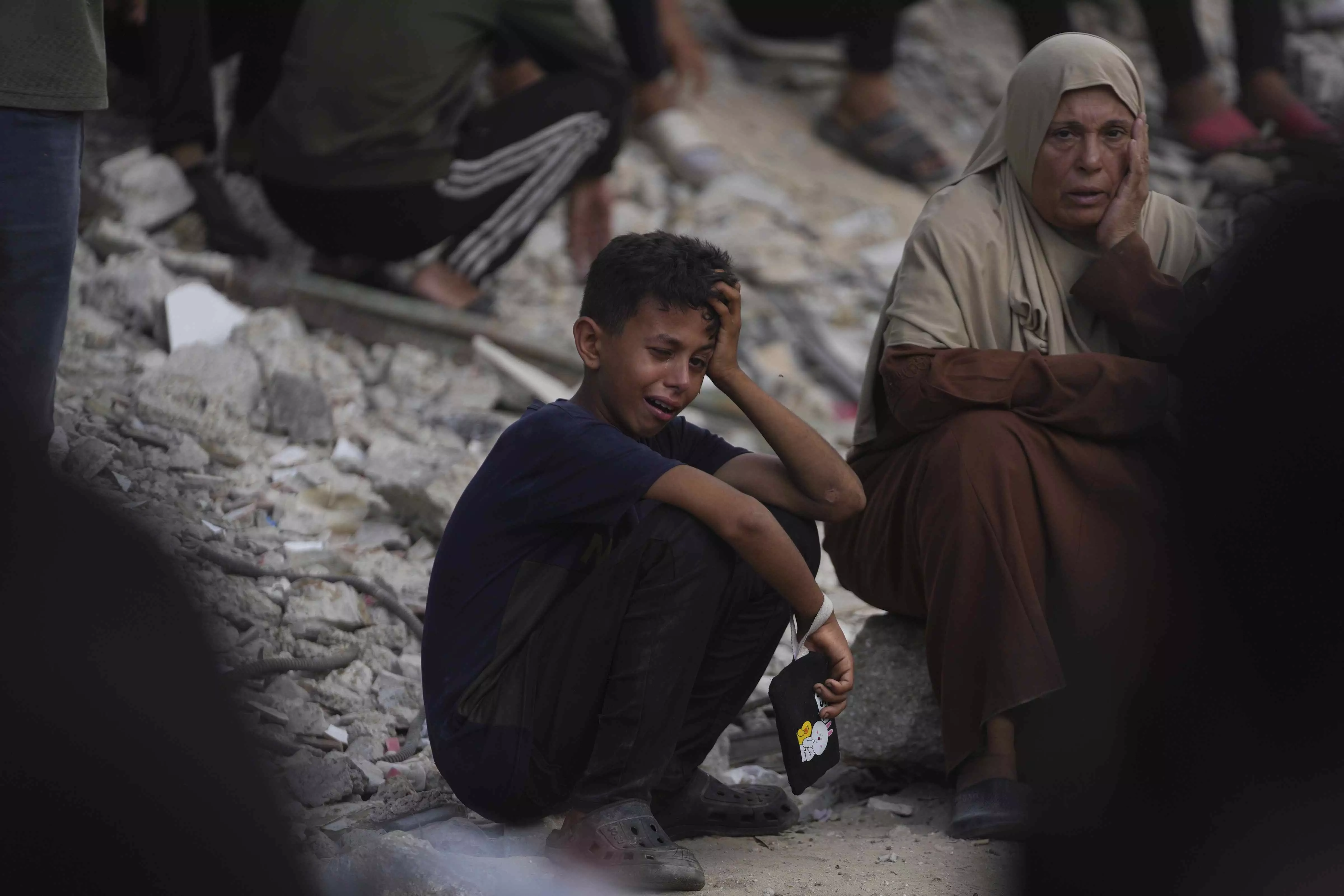 Israeli gunshots, strikes kill at least 25 in Gaza, some while seeking aid