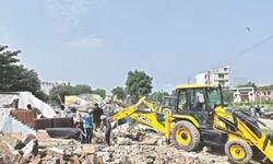 Encroachments cleared, contractors fined Encroachments cleared, contractors fined