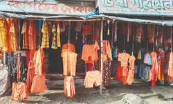 Balurghat sees surge in demand for spl saffron attire during ‘Shravan’