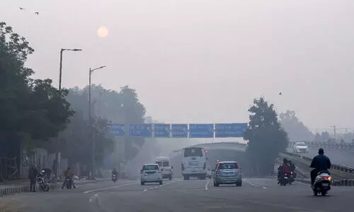 Delhi sprayed with rain; min temp down 1.5 notches