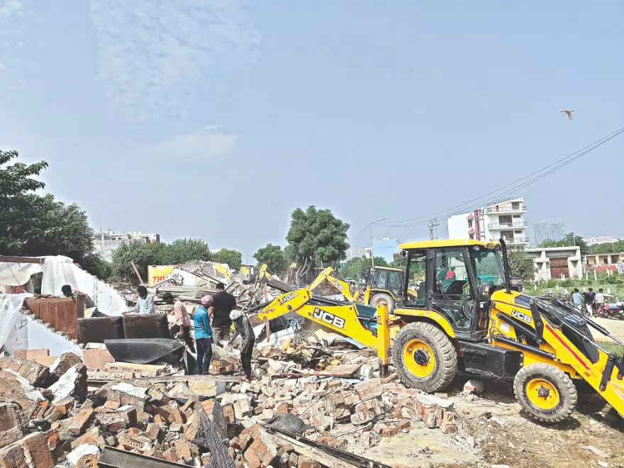 Encroachments cleared, contractors fined Encroachments cleared, contractors fined