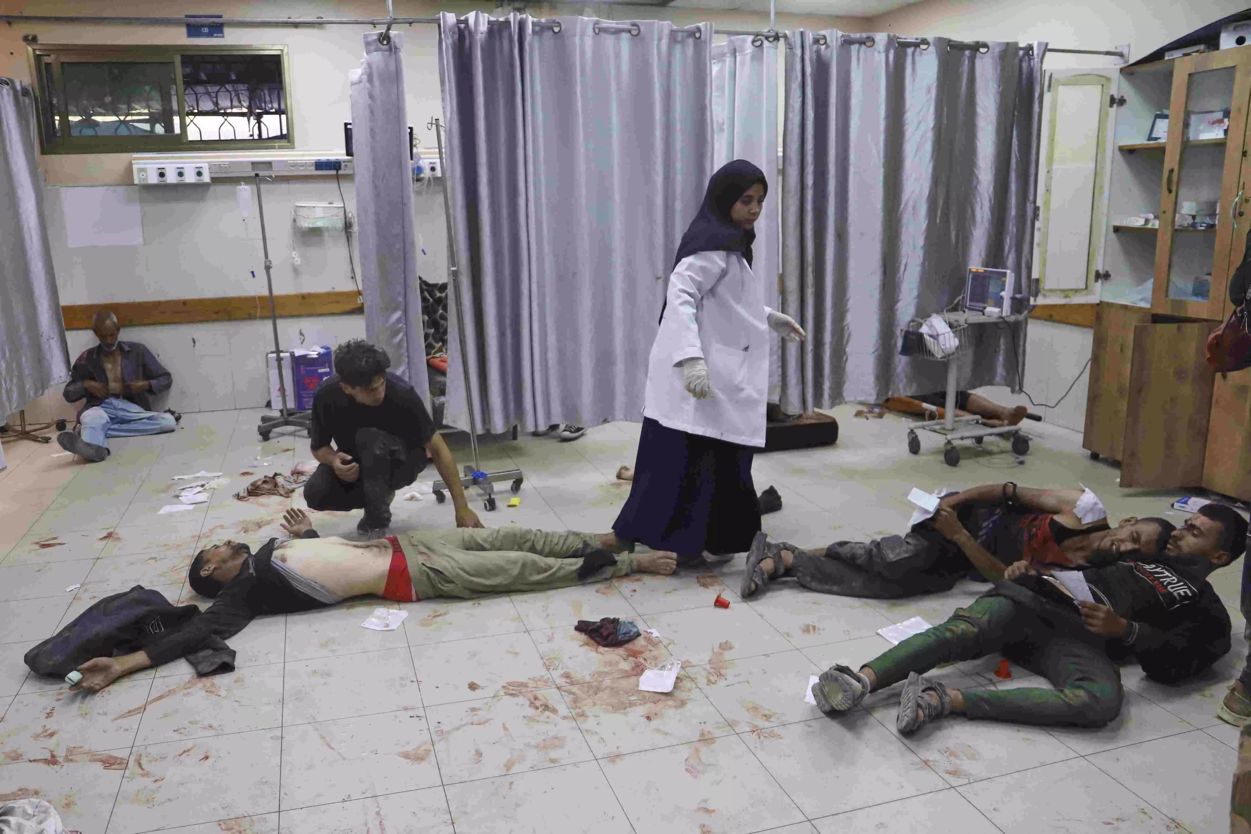 Israeli strikes kill at least 34 people in Gaza, officials say, as some aid restrictions eased
