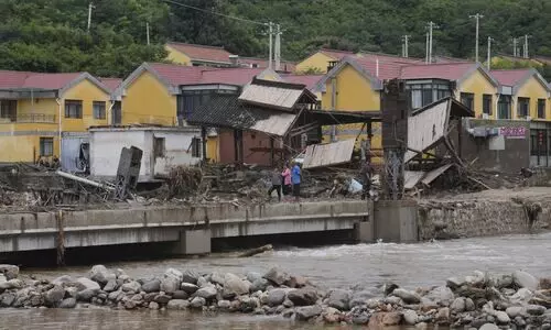 30 killed in heavy rain, floods in Beijing; China launches all-out relief efforts
