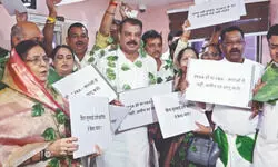 Congress MLAs stage leaf-garland protest in Madhya Pradesh Assembly over tribal rights Congress MLAs stage leaf-garland protest in Madhya Pradesh Assembly over tribal rights