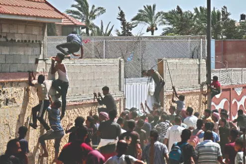 Over 40 Palestinians killed, most of them among crowds seeking food Over 40 Palestinians killed, most of them among crowds seeking food