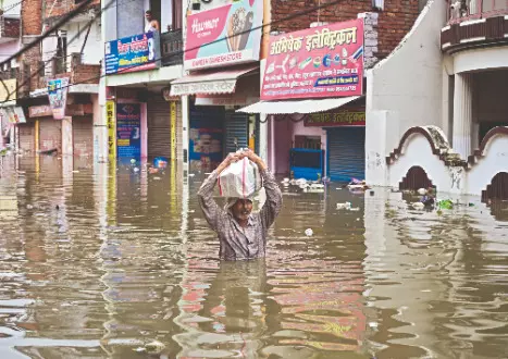 Flood situation in UP worsens; Bihar rivers in spate amid rains Flood situation in UP worsens; Bihar rivers in spate amid rains