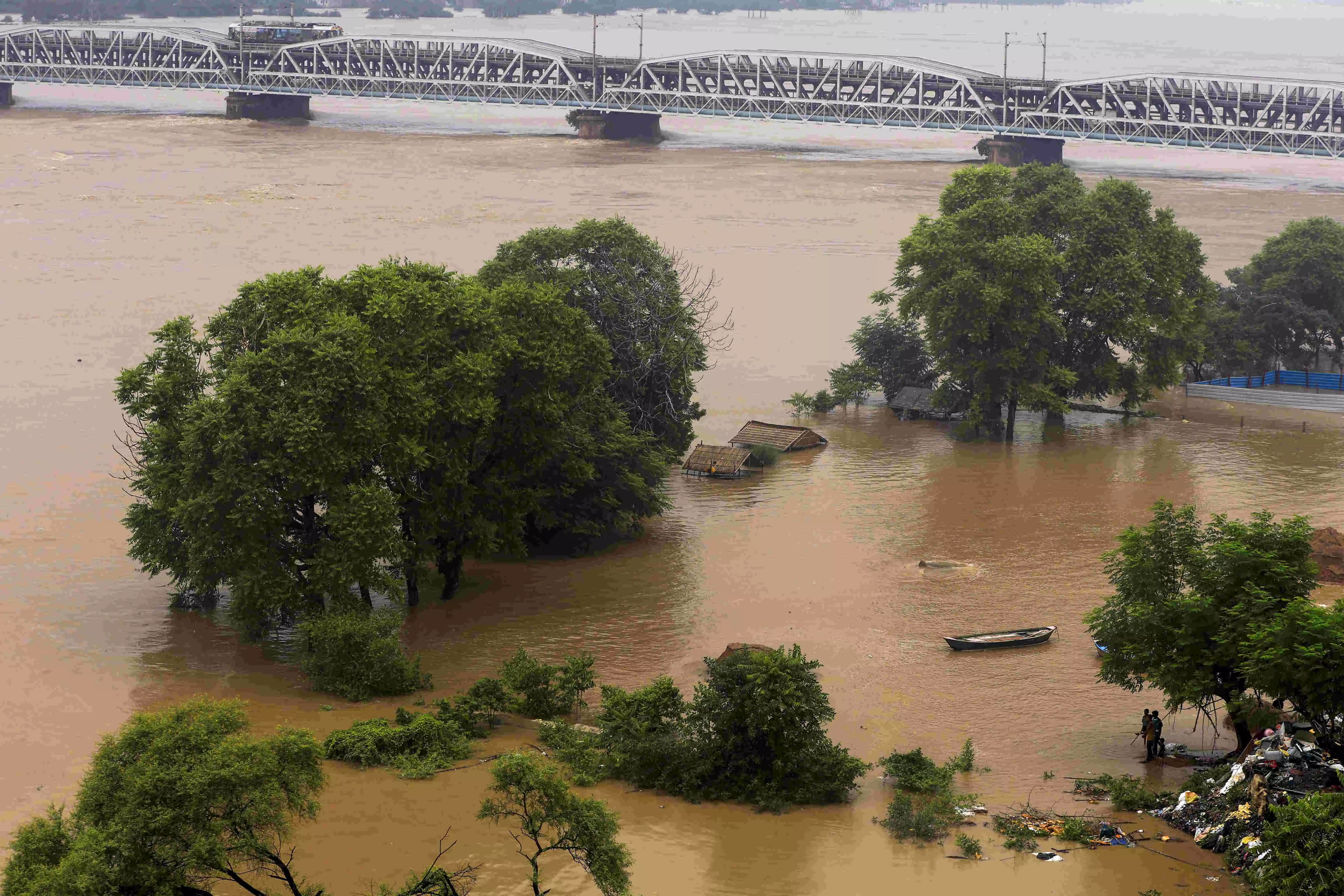 Floods in 13 UP districts; Ganga flows above danger mark in Varanasi, Prayagraj Floods in 13 UP districts; Ganga flows above danger mark in Varanasi, Prayagraj